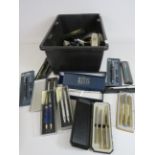 Large quantity of pens and pencils including boxed sets etc.