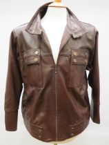 Very Soft Brown Leather jacket with double breasted pockets. UK size Small to Medium. See photos.