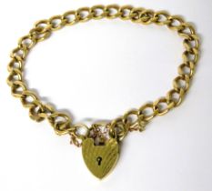 9ct Yellow Gold Flat link Bracelet with safety chain fitted. Heart Padlock clasp. 7 inches long .  W