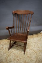 Oak Rocking chair . Some attention needed to one arm. See photos. S2