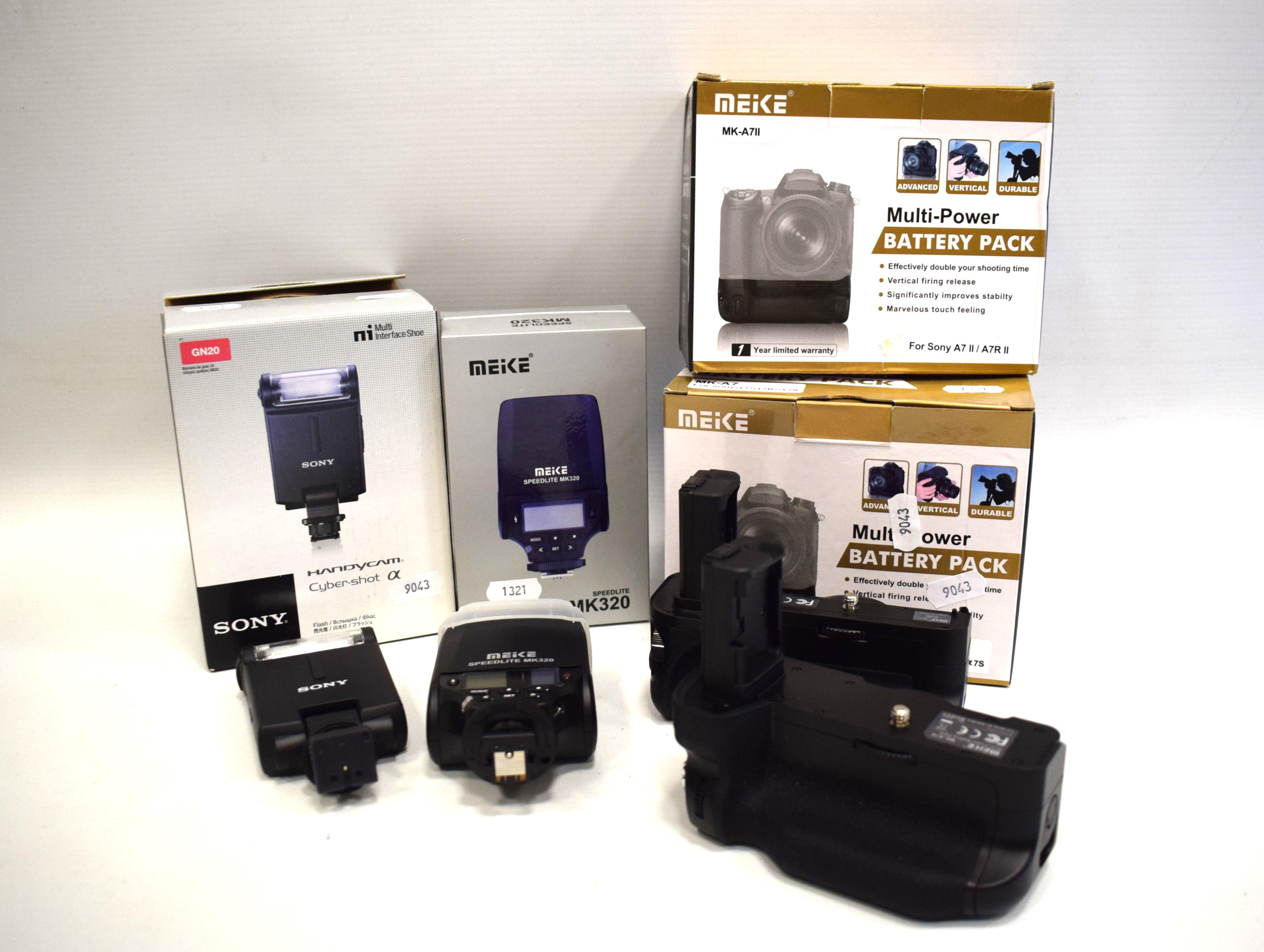 Sony A7R2 or A72 Battery Multi power Pack.  Speedlight flash gun MK320  .  Sony Cybershot multi Inte