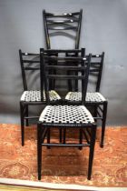Four Vintage Ebonised chairs with checkered banding to tops. See photos.