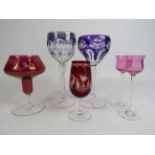 Selection of glasses including Bohemian cut to clear hock glasses. Small pink glass do have chips to