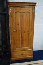 Single pine wardrobe with hanging rail inside. Blanket drawer to base, H:71 x W:28 x D:19 inches.