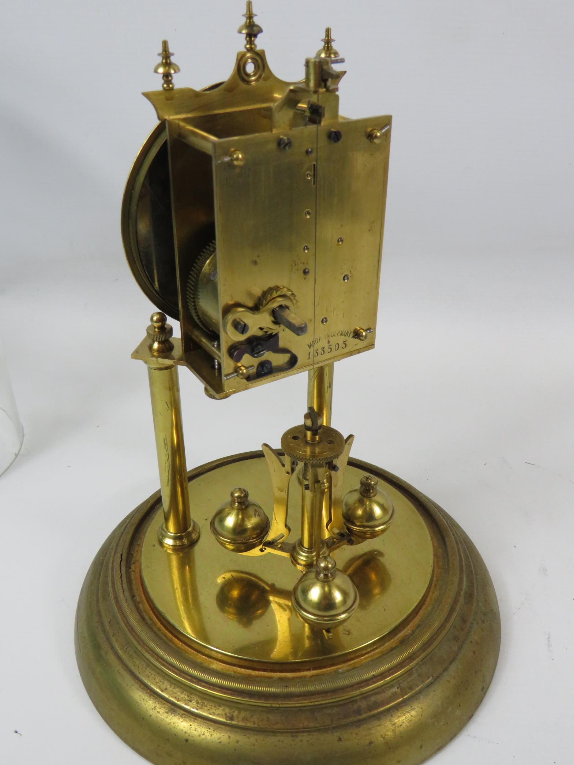 German Made Brass based Anniversary clock with enamel Dial. Sits under a Glass dome which measures - Image 4 of 4