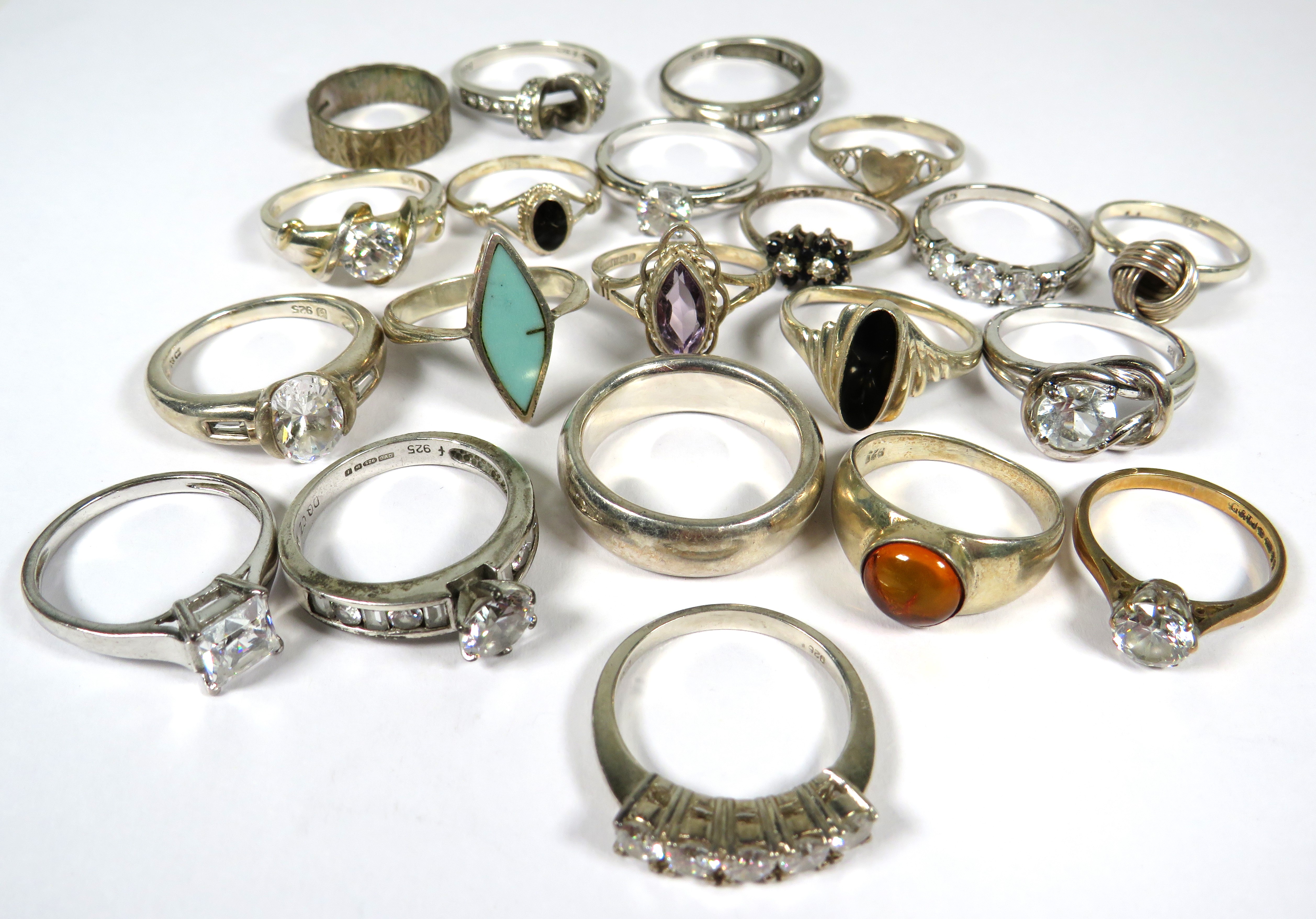 Twenty one Good quality Stone set 925 Silver rings of various sizes. See photos. 