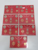 Seven Perspex Collectors pack of 1967 Coins of Great Britain . See photos.