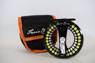 Farrio Click Reel with original soft carry pouch.