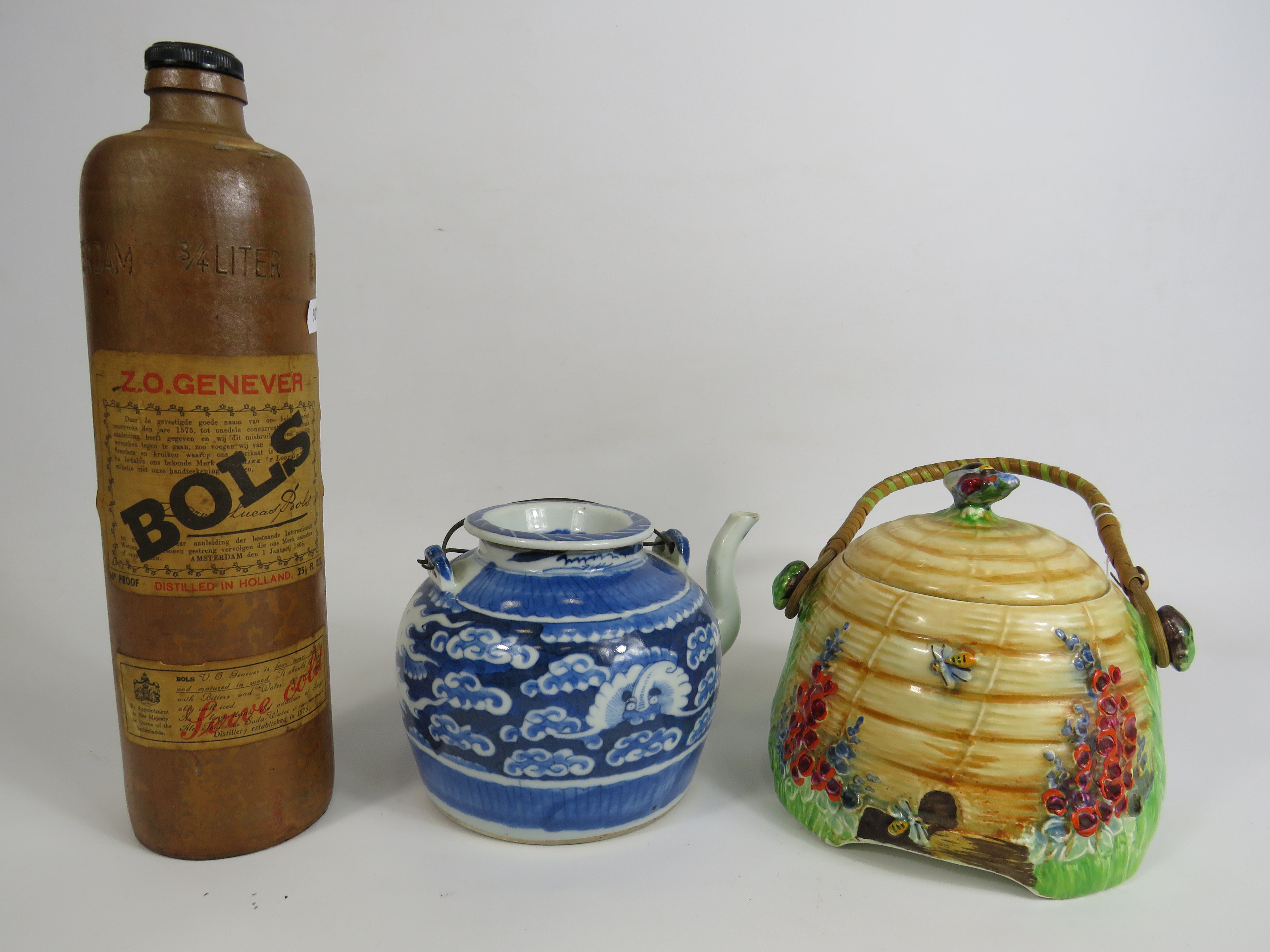 Mixed lot to include a Royal Winton biscuit jar, stoneware Bols bottle and a chinese teapot.