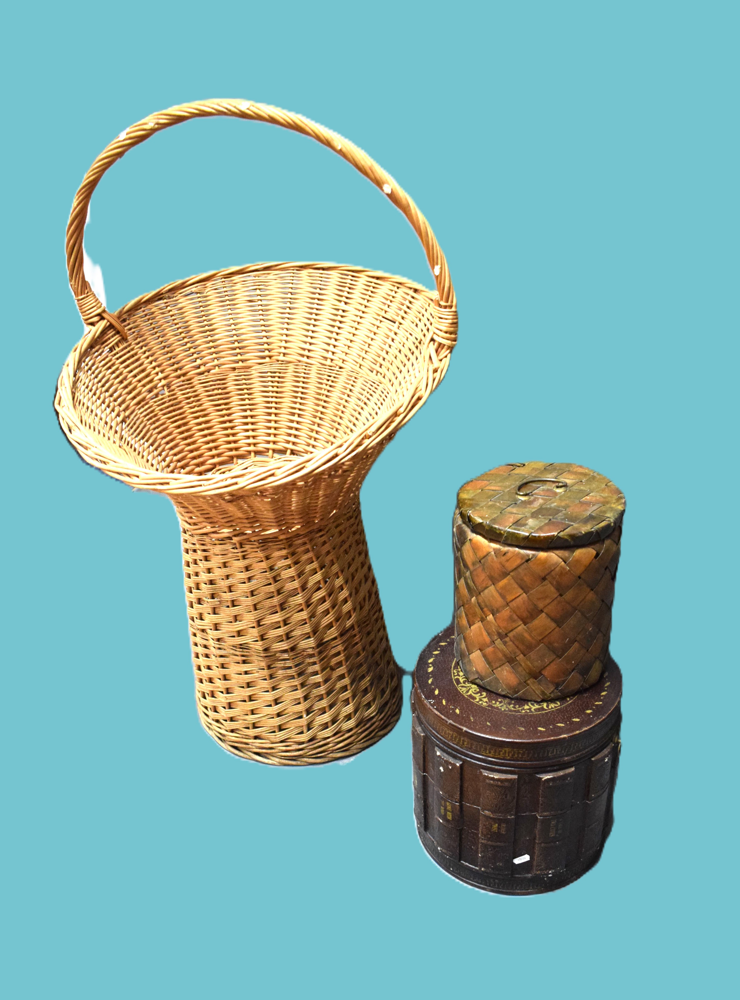 Large wicker basket on stand. Could make log basket plus two ornamental storage bins.  See photos. 