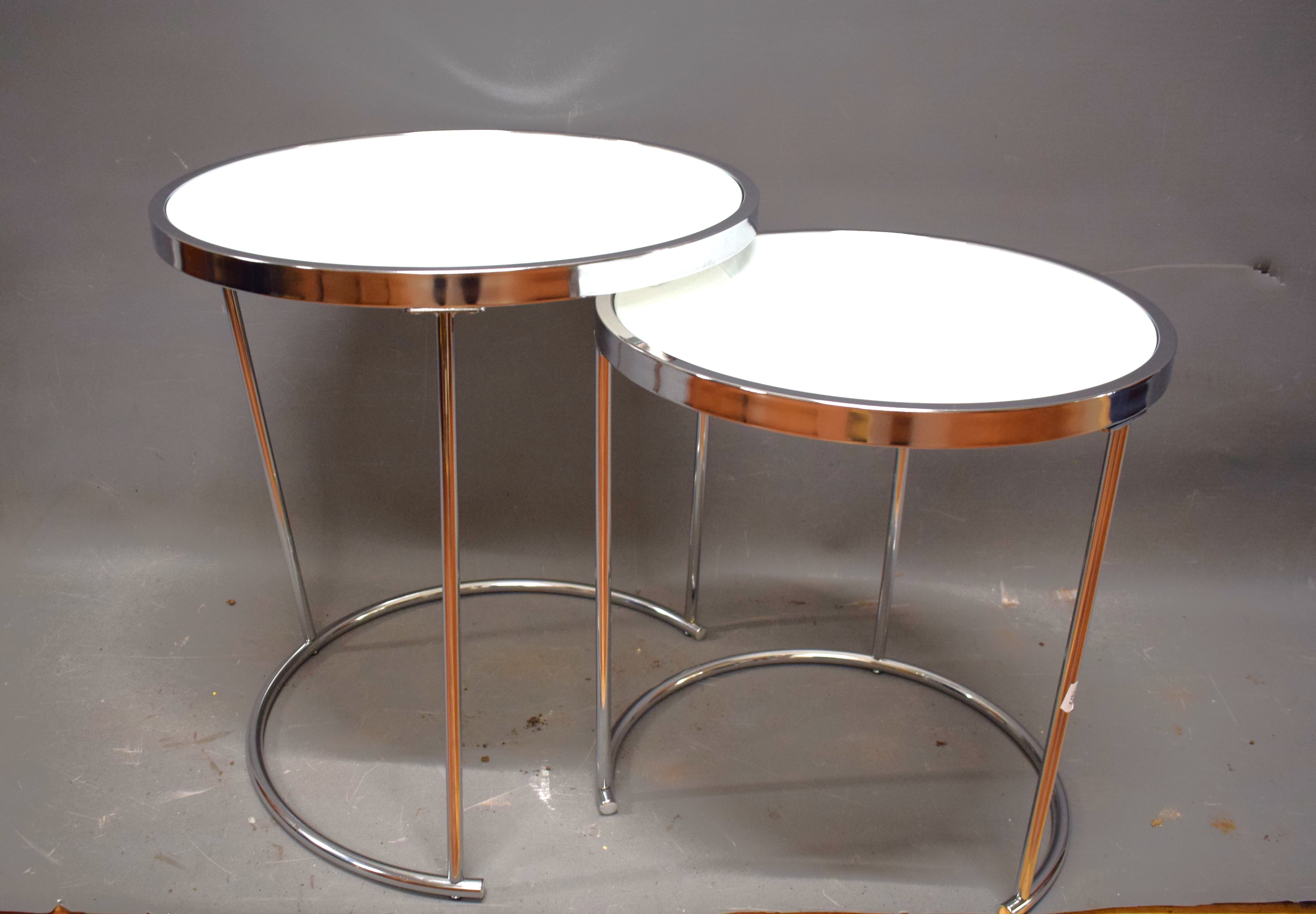 Two Occasional Stacking table in chrome with Glass tops.    H: 20 inches tall.  See photos.   S2