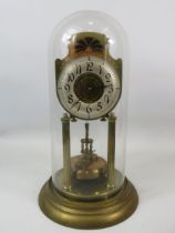 Large German Made Brass Based Anniversary clock under Glass dome which measures approx 14 inches