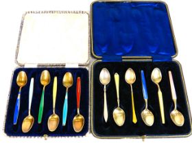 Two Cases of Silver Spoons decorated with Lemon gilt and Guilloche enamel panels. Housed in non ori