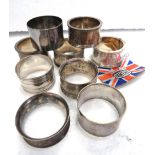 Selection of Ianeath silver plate napkin rings plus one hallmarked silver napkin ring.  See photos. 