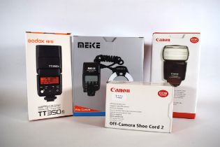 Four Camera Flashes by Canon, NEKE which fits Canon MK14 plus a Godox TT350. All Boxed. See photos. 