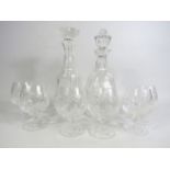Two good quality crystal glass decanters and six Stuart crystal wine glasses.