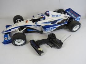 Large F1 Remote control recing car, approx 29" long with controller but unsure if its correct for