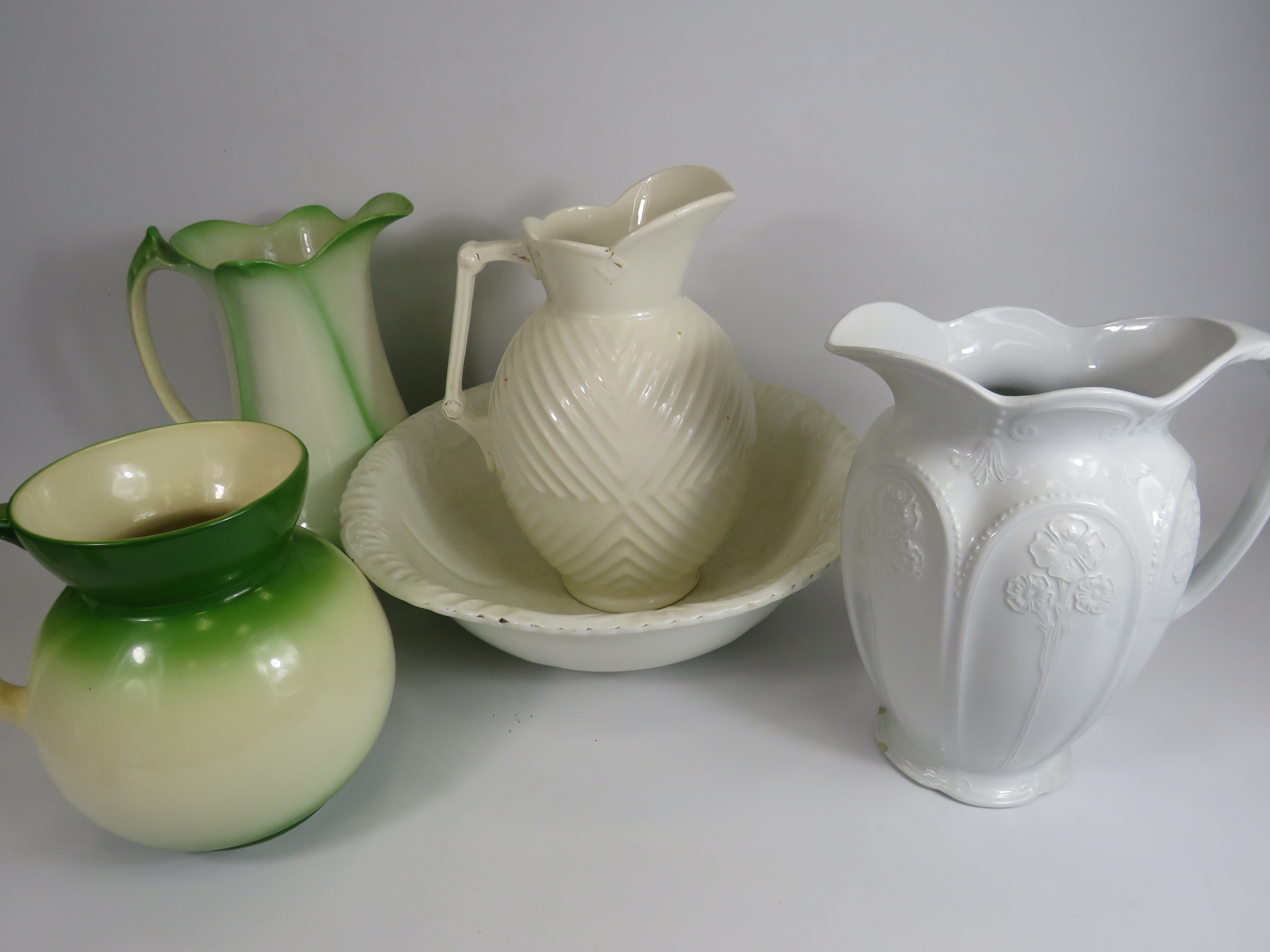 4 vintage wash jugs and a wash bowl, one jug does have chips to the base. - Image 2 of 4