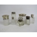 Selection of mainly Sterling silver topped bottles and pots etc.