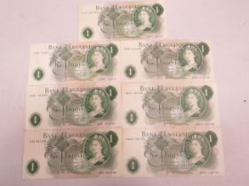 Seven Near Mint Vintage UK One Pound Notes, some consecutive numbers. See photos.