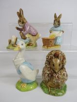 4 Beswick Beatrix potter figurines, the tallest stands approx 9.5cm.
