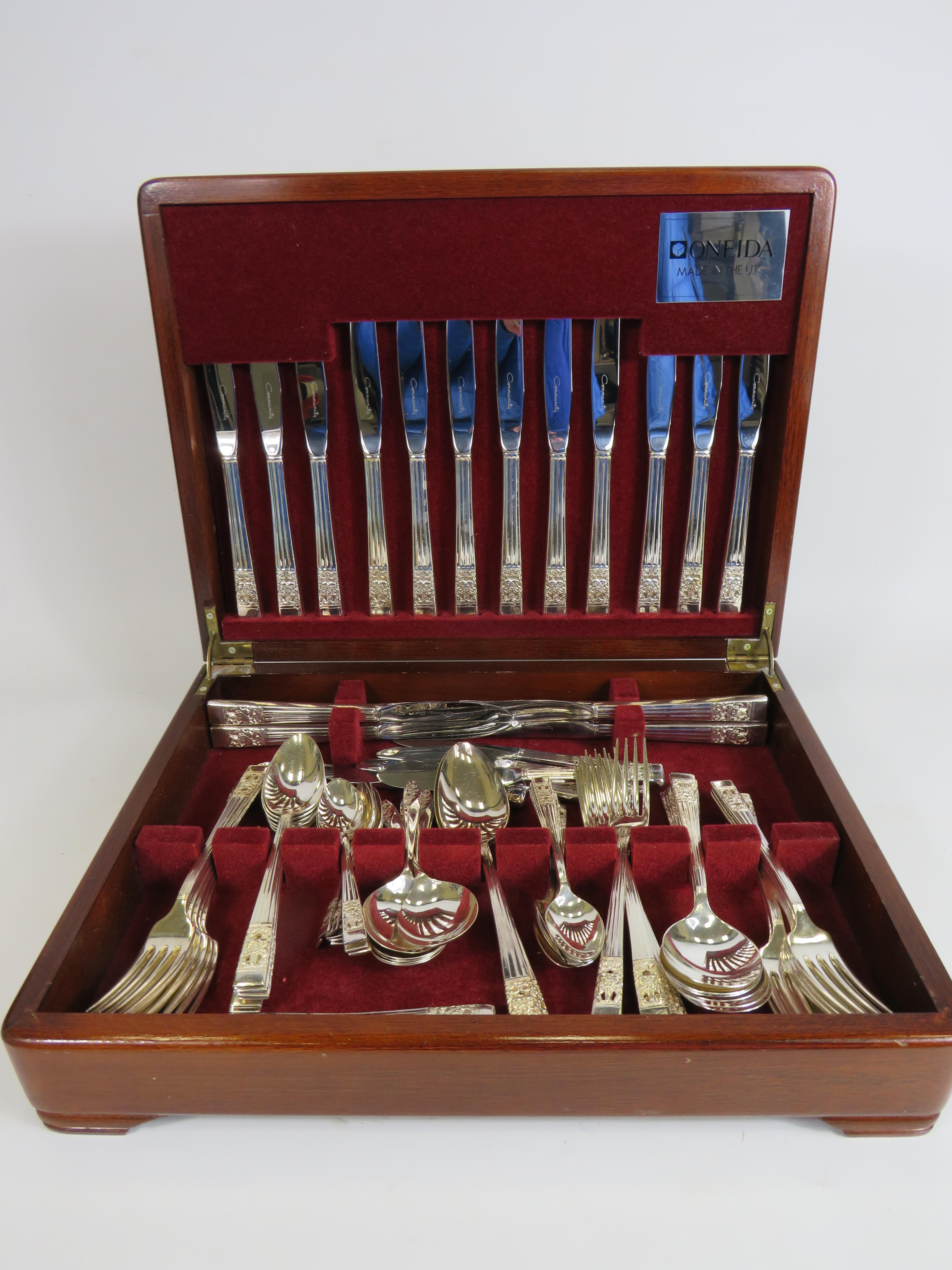 79 Piece Oneida cutlery set in wooden case.