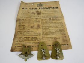 Local interest air raid precautions notice and Norfolk Hussars and Royal Signals cap badges.