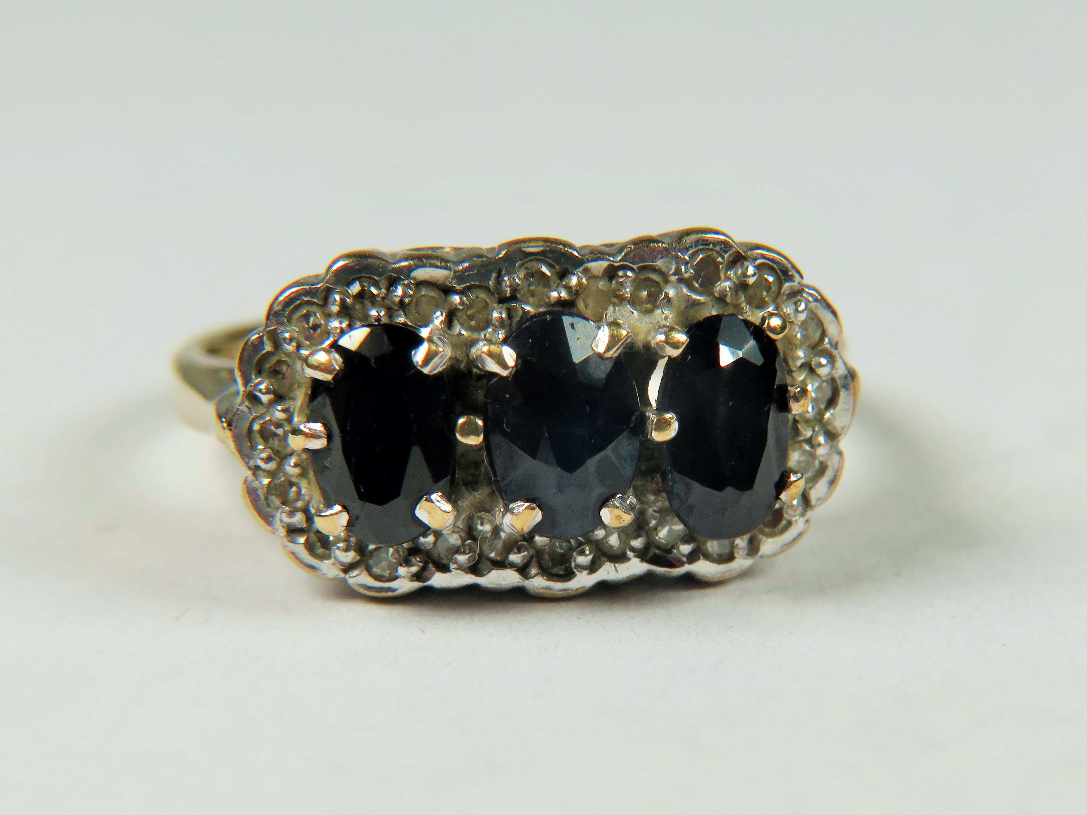 9ct Gold ring set with Triple Sapphires with Diamond surround.   Finger size 'L-5'  3.2g - Image 5 of 5