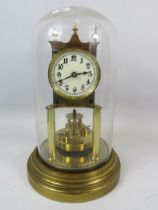 Gustav Becker Brass based Anniversary Clock under a Glass dome. Running order but no key present.