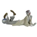 Large Lladro clown figurine model no 4618, 15.5cm tall and 37cm long come with box.