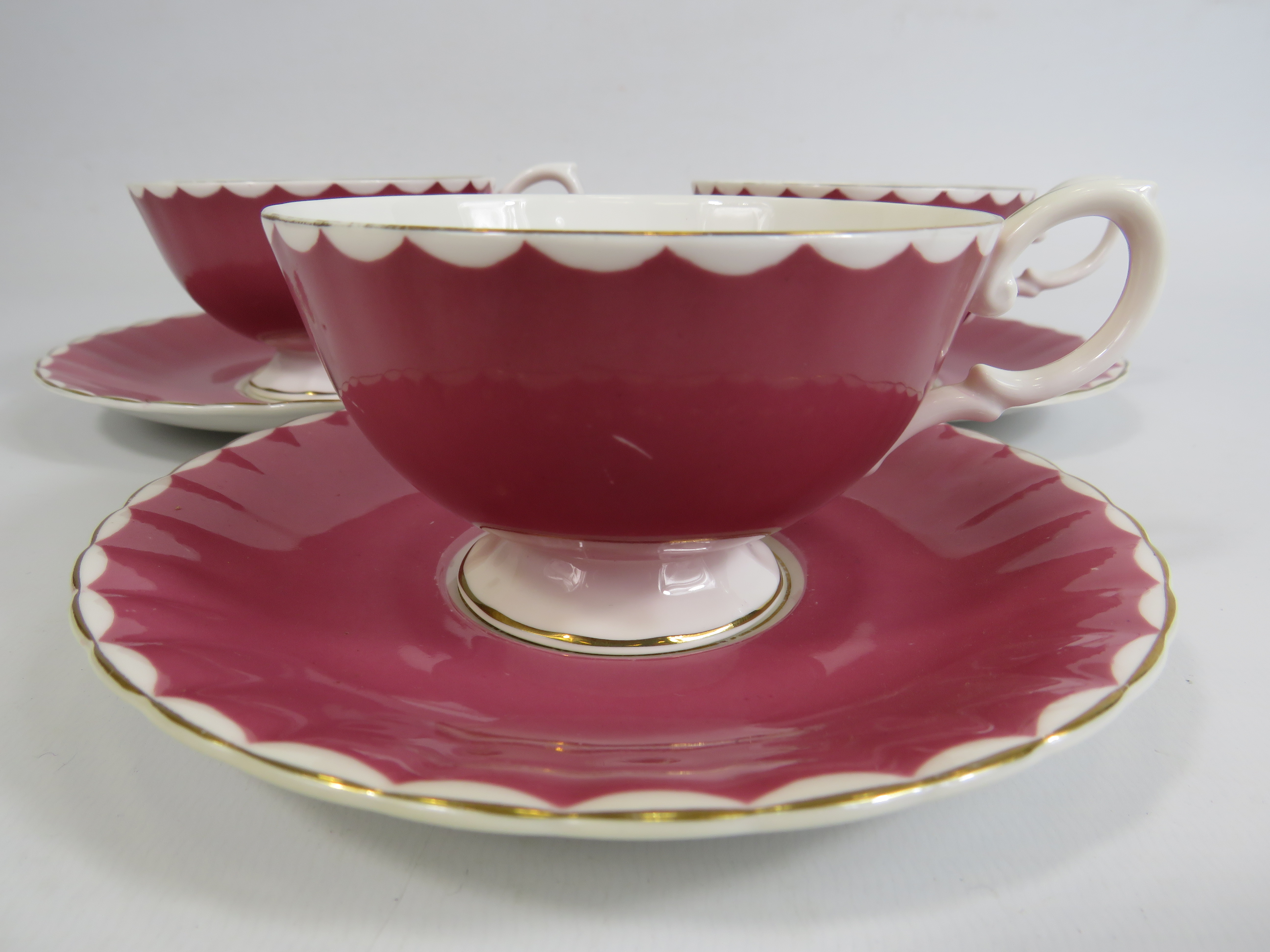 3 Susie Cooper pink cabinet cups and saucers with floral decoration to the bowl. - Image 3 of 4