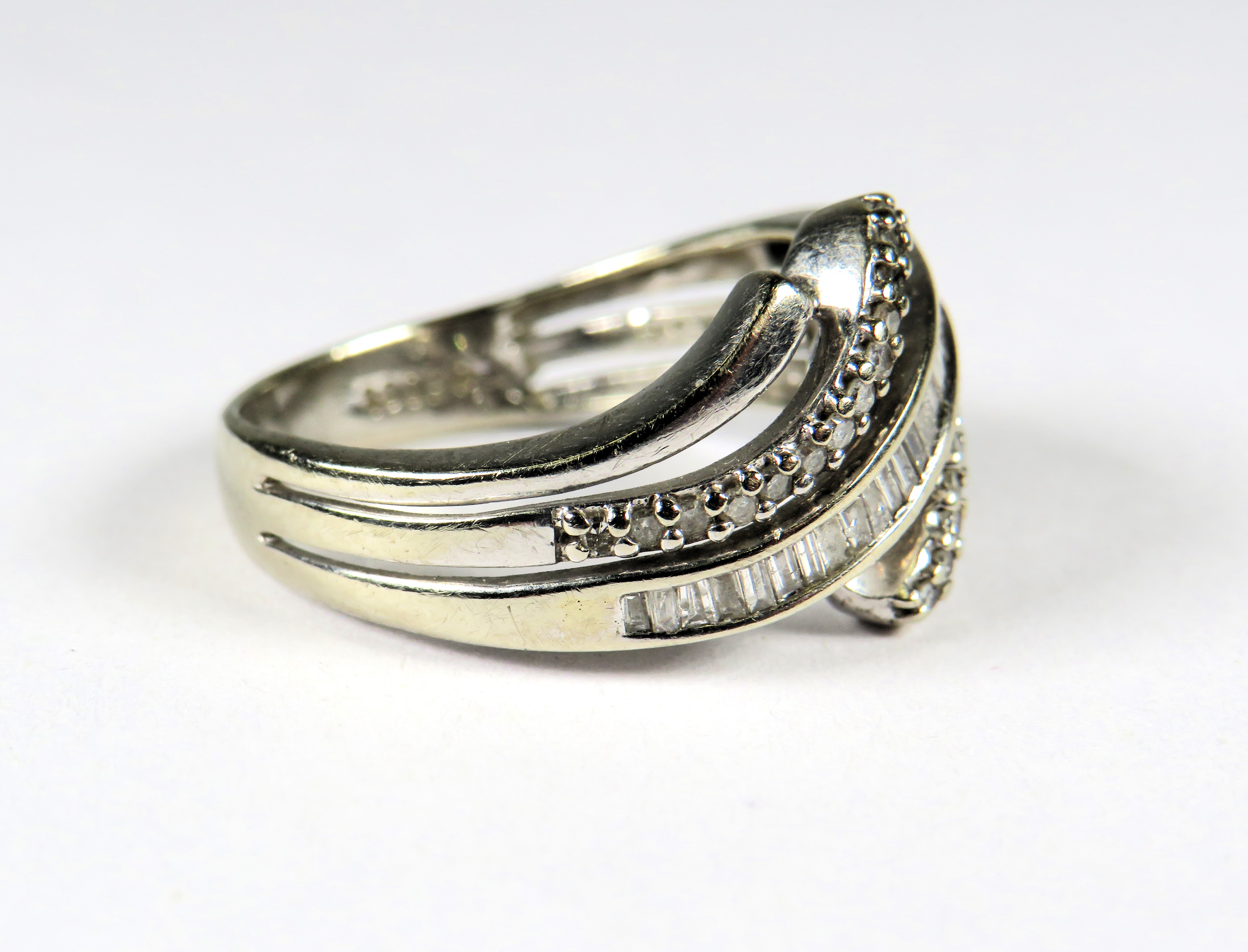 9ct White Gold Multi Diamond set wave ring. (approx 0.50pts Diamonds)  Finger size 'O'   3.4g - Image 3 of 3