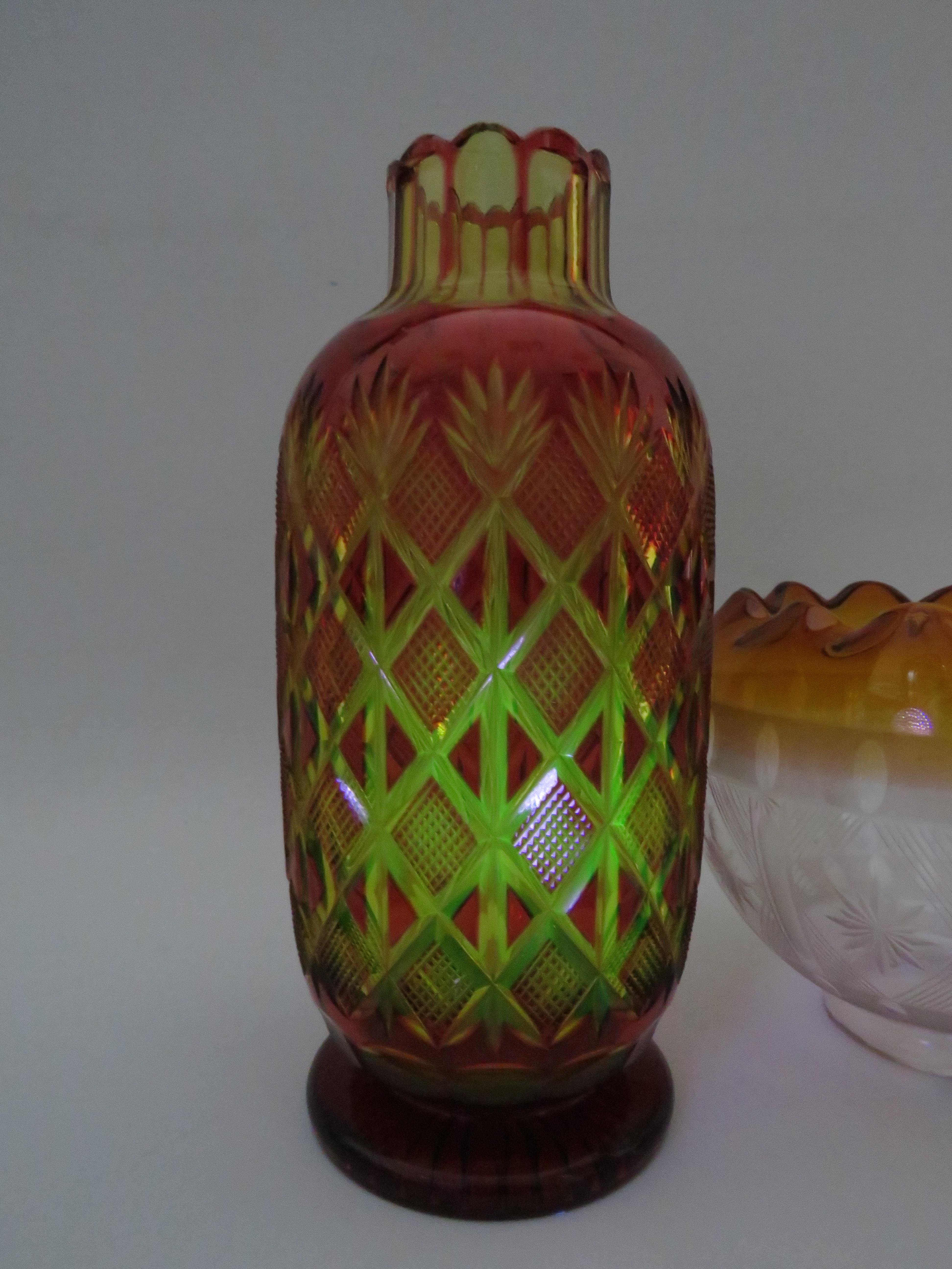 Ruby cut to amber Bohemian uranium glass vase, slight chips to the rim. The vase stands 24cm tall. - Image 2 of 4