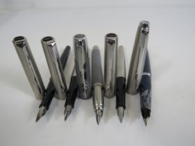 Selection of various boxed Parker fountain pens.