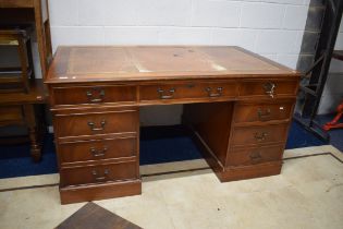 Large and deep pedestal desk . Wear to leather top. Four drawers to each side. Measures H:60 x W: