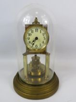 Gustav Becker Brass based Anniversary Clock under a Glass dome. Running order but no key present.