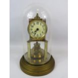 Gustav Becker Brass based Anniversary Clock under a Glass dome. Running order but no key present.