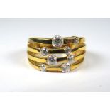 9ct Yellow Gold Ring set with CZ Stones on four strands in the patten of Pleiades Constellation.   F