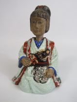 Antique oriental ceramic nodding head figure, 13.5cm tall.