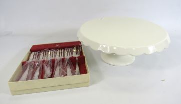 Cream Scaloped edged cake plates and a set of 6 cake forks.