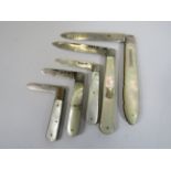 5 Sterling silver and mother of pearl penknives.
