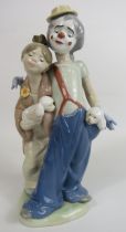 Lladro Clown and girl figurine model no 7686, 22.5cm tall with box.