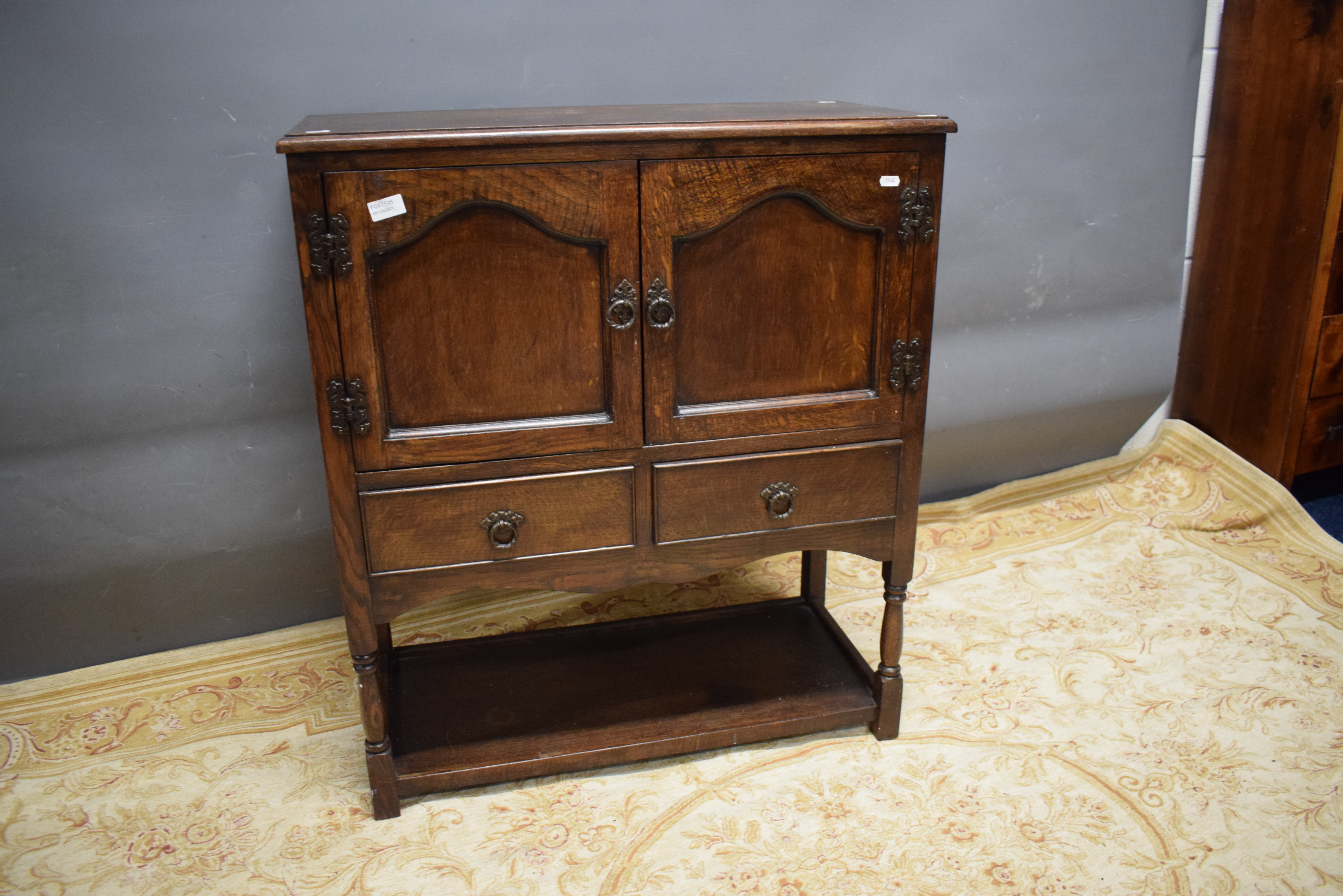 Old Charm style Oak cabinet with shelf. See photos. 80cm wide, 37cm deep and 91cm tall.