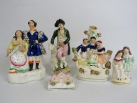 Selection of Various antique staffordshire flatback figurines and spill vases.