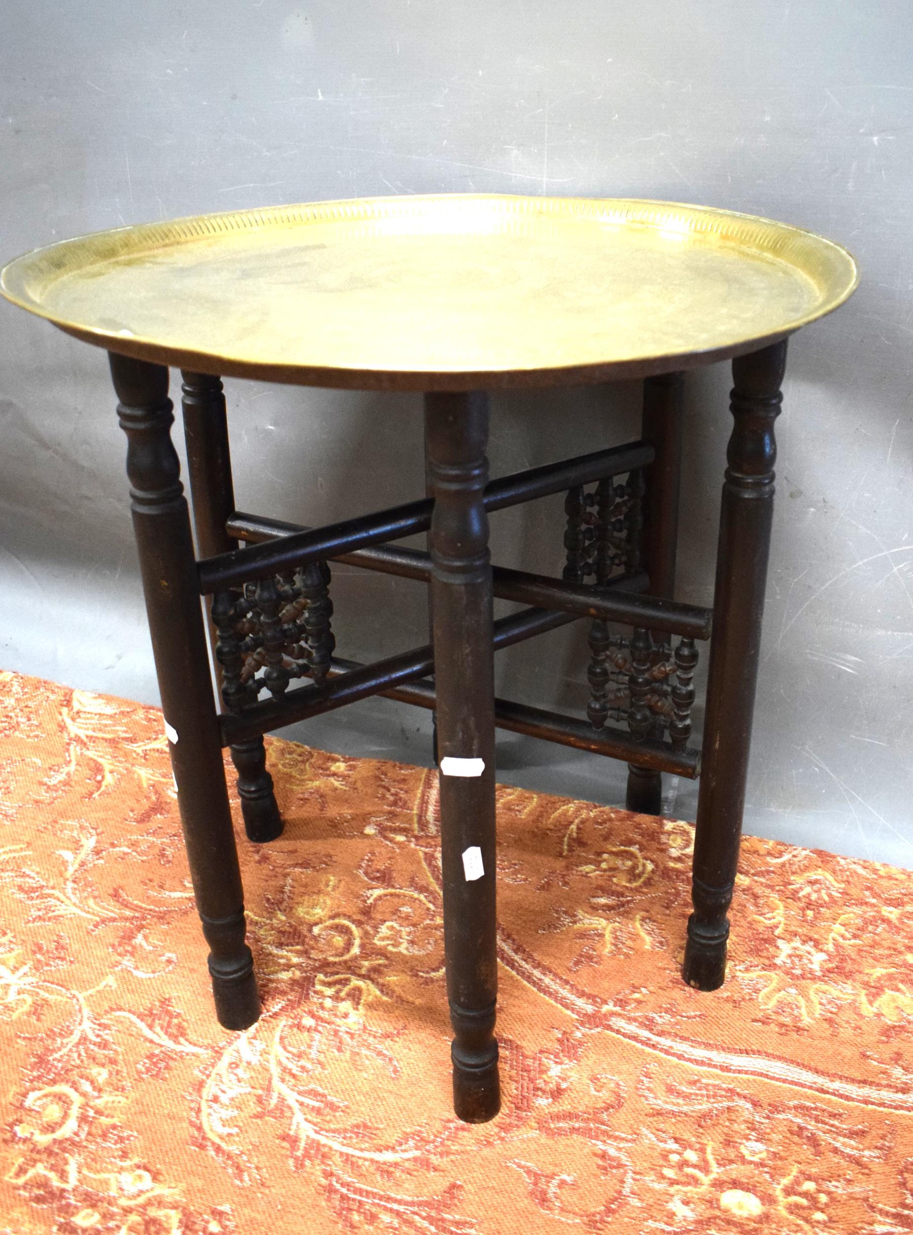 Folding wooden table plus detailed brass top    22 inches tall,  23 inches diameter. See photos.  S2 - Image 2 of 2