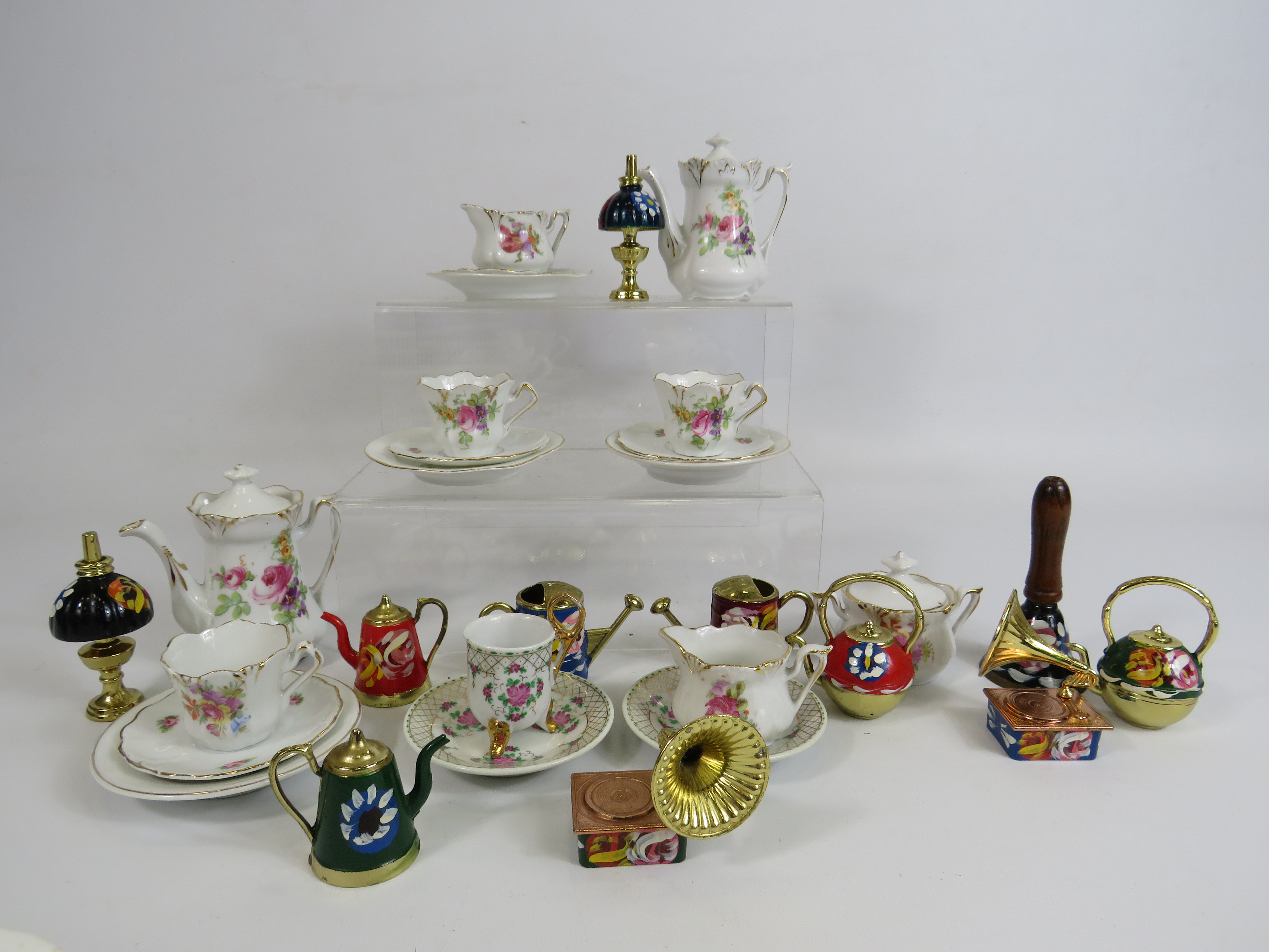 Selection of Miniature teaset and mini barge ware items in ceramics and brass.