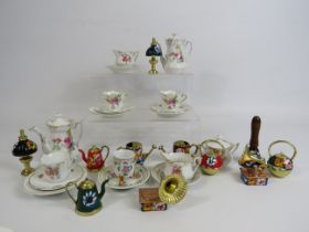 Selection of Miniature teaset and mini barge ware items in ceramics and brass.