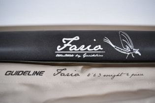 Four piece Fly rod Guide line Faria 8ft 6 inches with cloth bag and hard carry case.