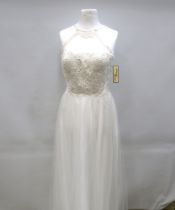 As new and unused Prom Dress or Ball Gown by Crystal Breeze in Ivory. Back Zip. UK size 14. See phot