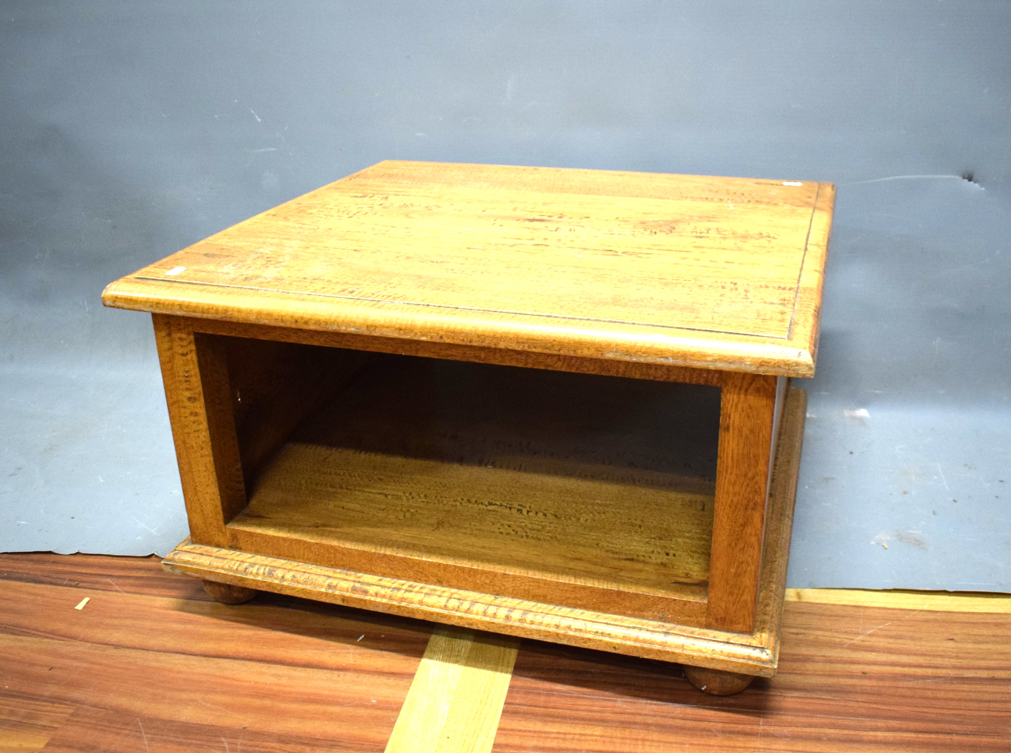 Square Oak Coffee Table raised on bun feet. Measures approx H:16 x W:27 x D: 27 inches. See photos.  - Image 2 of 3